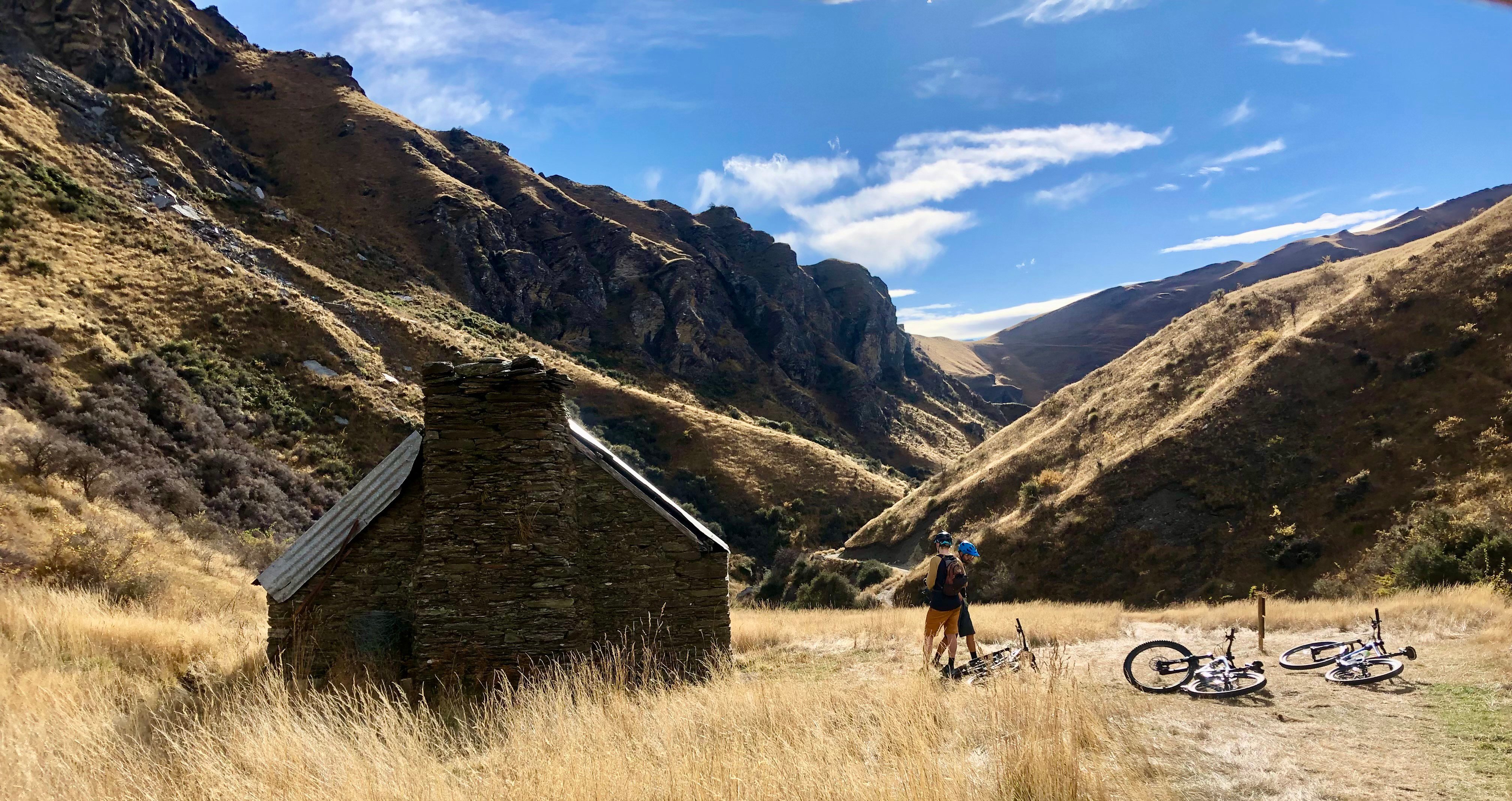 cyclists-by-stone-hut-cropped.jpg